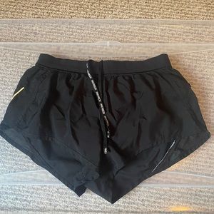 Two pairs of Victoria sport shorts- black and grey both size small